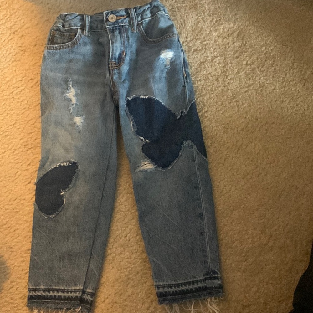 The Gap, jeans with butterfly patch. Adjustable size inside. Never been worn